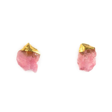 Front view of raw rose quartz stud earrings in gold-tone setting on white background.
